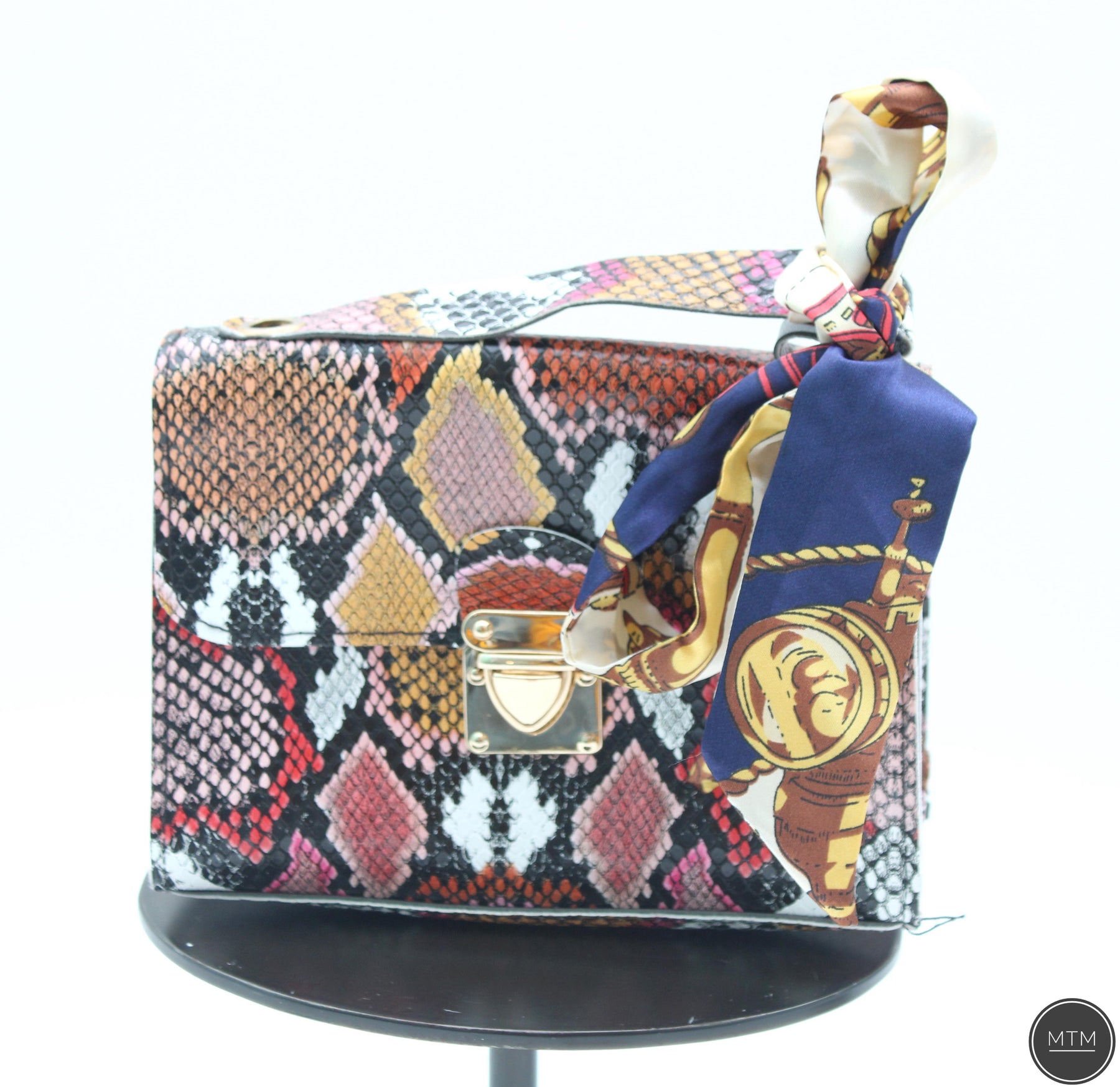 Unleash Your Inner Fashionista with the Multicolor Snake Print Handbag