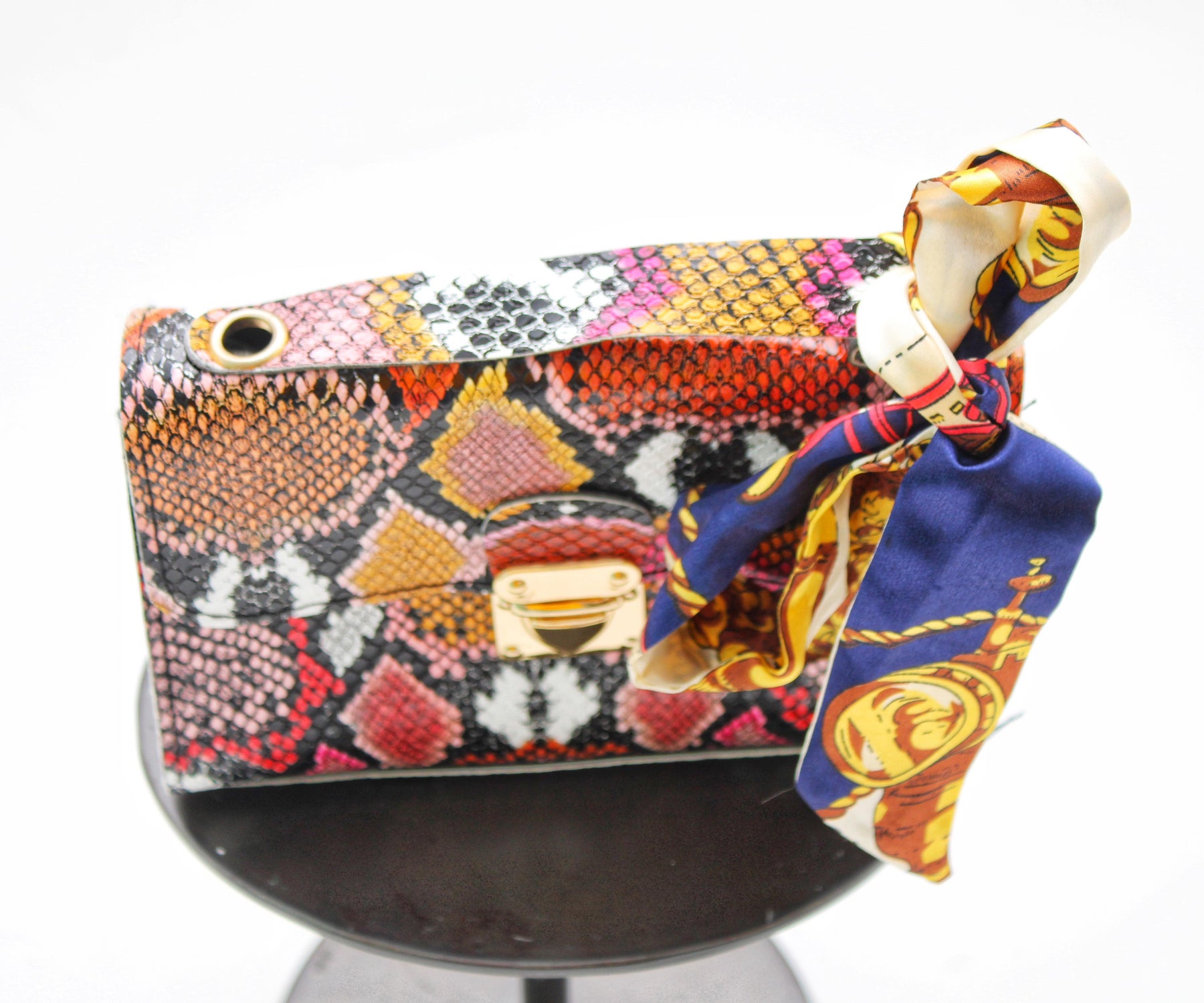 Unleash Your Inner Fashionista with the Multicolor Snake Print Handbag