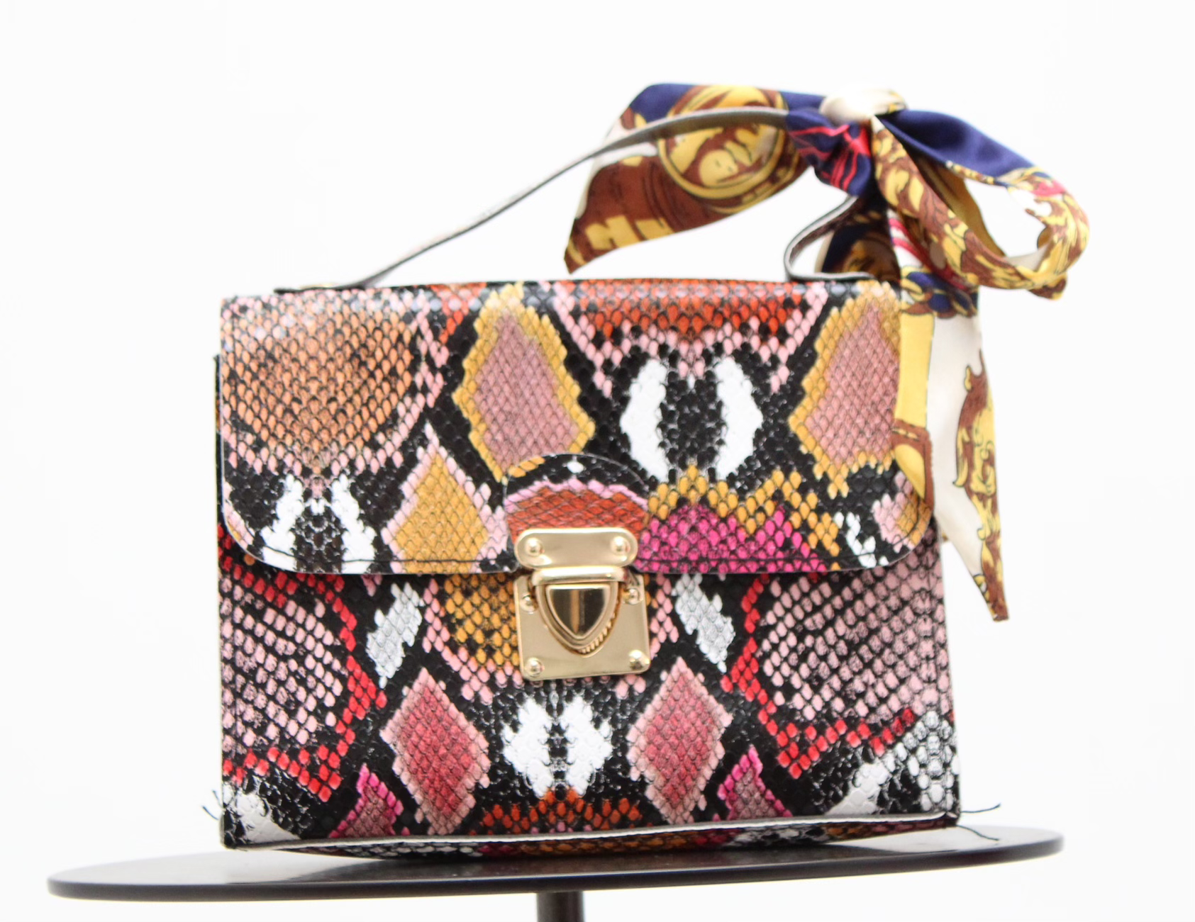 Unleash Your Inner Fashionista with the Multicolor Snake Print Handbag