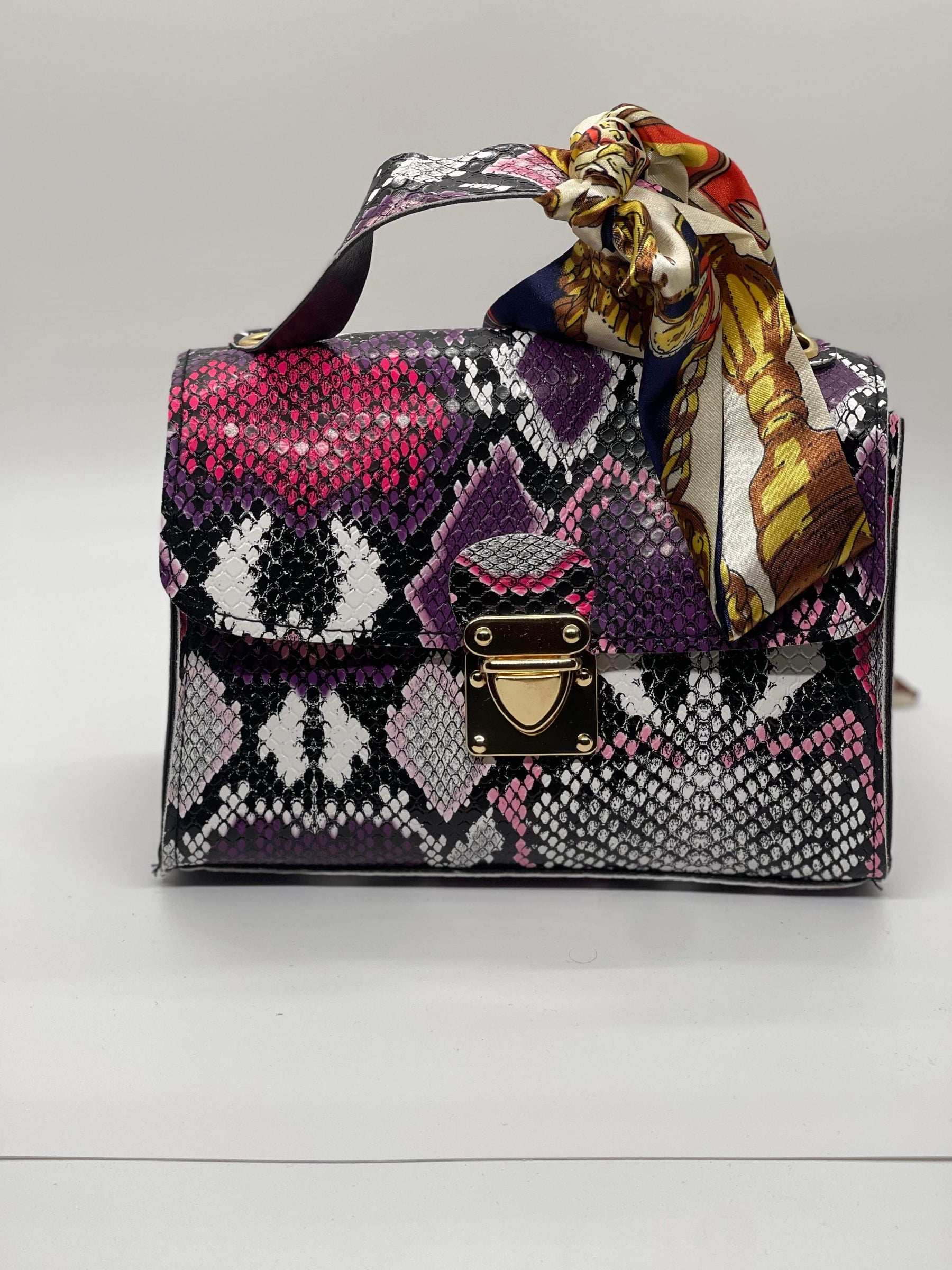 Unleash Your Inner Fashionista with the Multicolor Snake Print Handbag