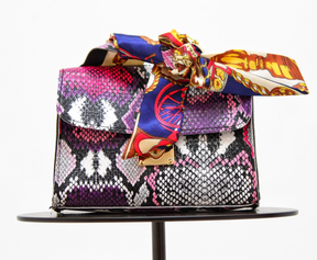 Unleash Your Inner Fashionista with the Multicolor Snake Print Handbag